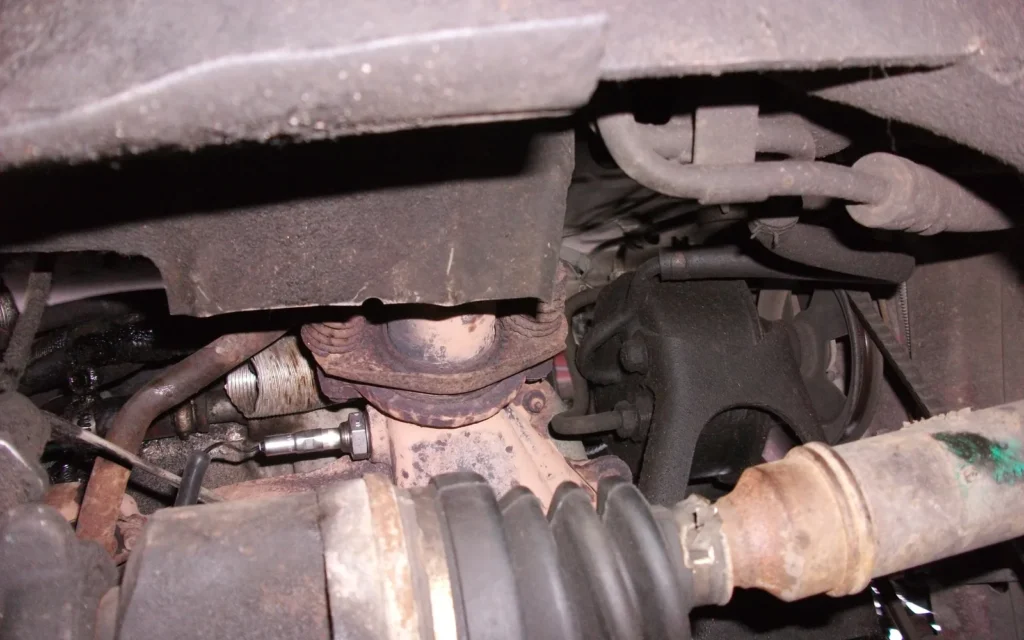A new oxygen sensor with its wiring pigtail and threaded body