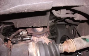 A new oxygen sensor with its wiring pigtail and threaded body
