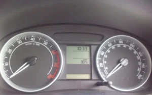 An instrument cluster showing the speedometer, tachometer and odometer display