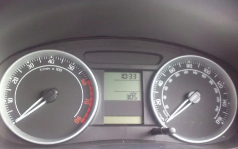 An instrument cluster showing the speedometer, tachometer and odometer display